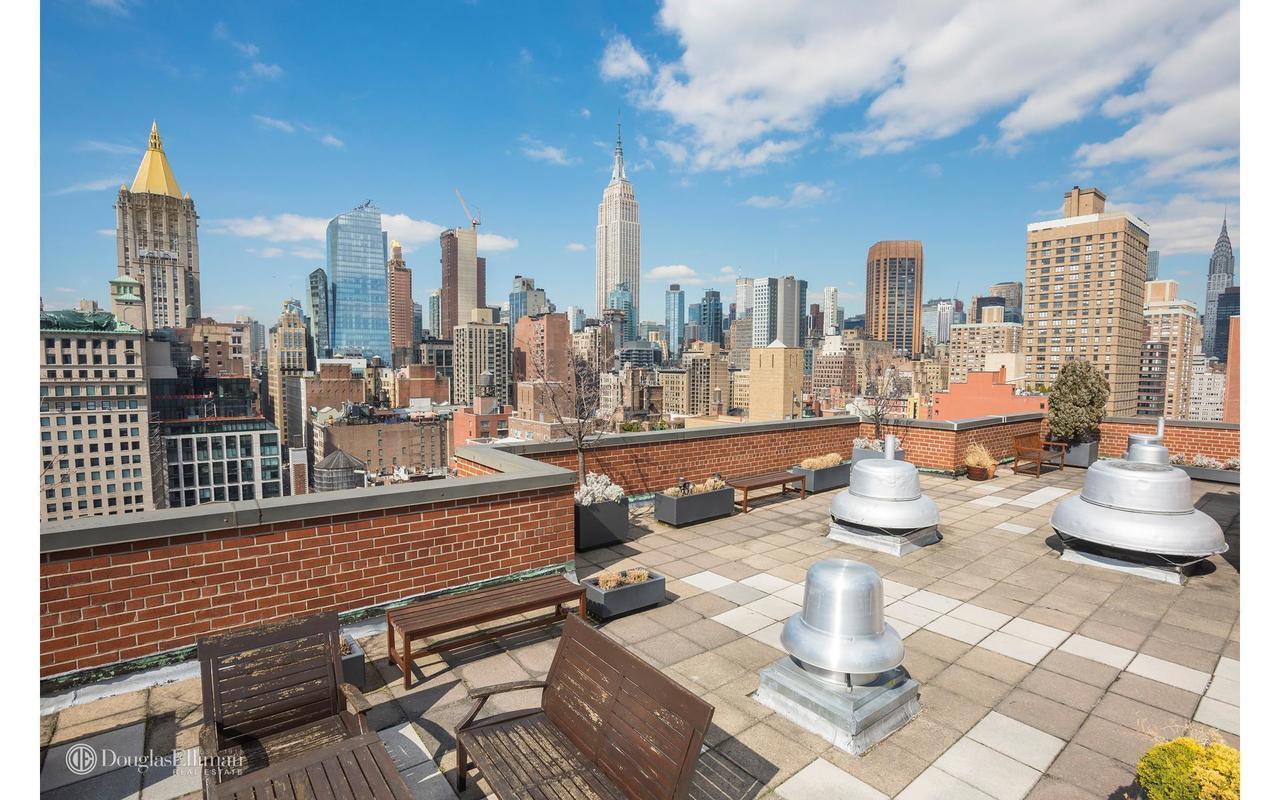 5 Manhattan apartments with roof deck access, listed for under 650,000